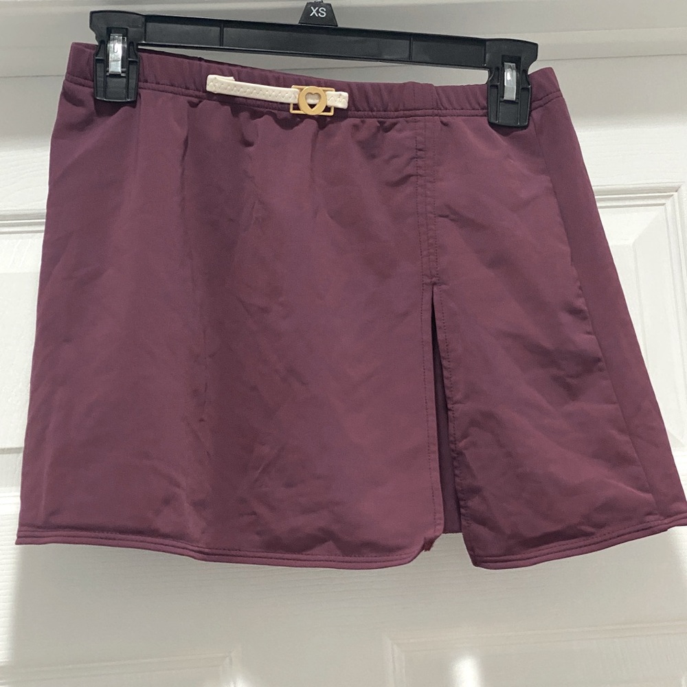 Swimwear covers up skirt.